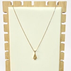 Nina Ricci Gold Tone Pendant Necklace